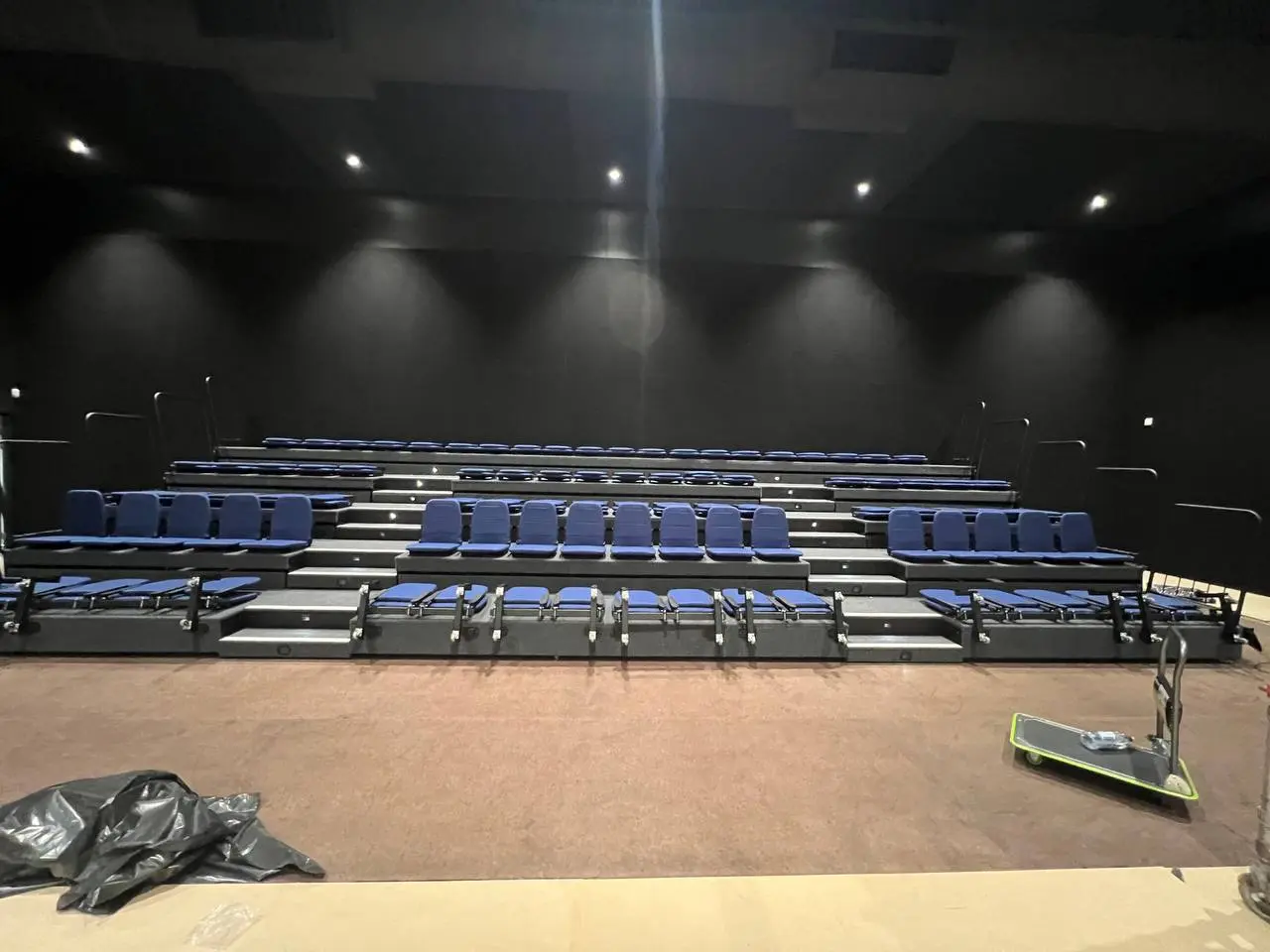 Education auditorium with tiered retractable seating